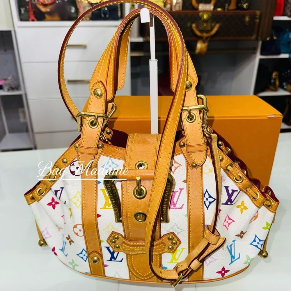 Louis Vuitton White and Orange Shoulder Bag with Monogram
Murakami